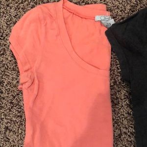 3 tighter fit, stretchy shirts. very comfy.